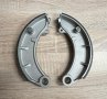 Brake shoes set for one wheel. Mounts on Balilla and Topolino.